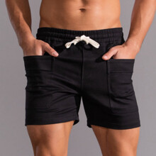 Pantaloncini sportivi da uomo in cotone tinta unita a vita media con