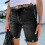 Korte denimshorts med knaplommer til damer 1