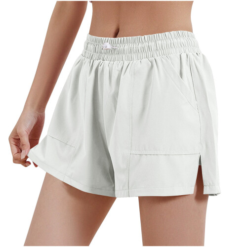 Ensfargede sportsshorts med lommer til dame 1