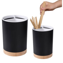 Estante ovalado negro para utensilios de cocina, ideal para colocar sobre la encimera.