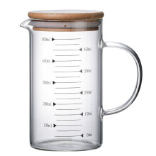 Vaso medidor de vidrio con tapa de bambú de 500 ml.