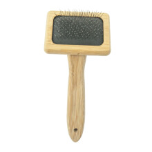 Pet grooming brush with wooden handle and metal wire