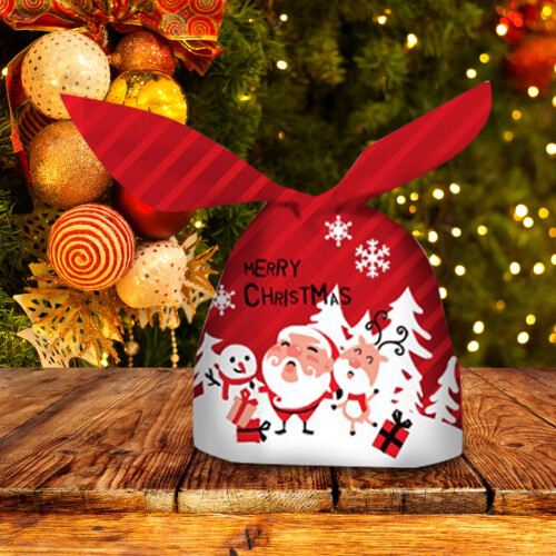 Weihnachtsgeschenkpapier mit Schneeflockenmotiv und Hasenohren 1