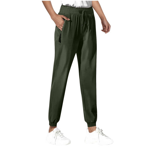 Damjoggingbyxor i polyester med lös passform och dragsko 1