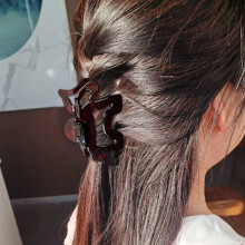 Pince à cheveux ajourée avec dents épaisses, poignée de-Noir