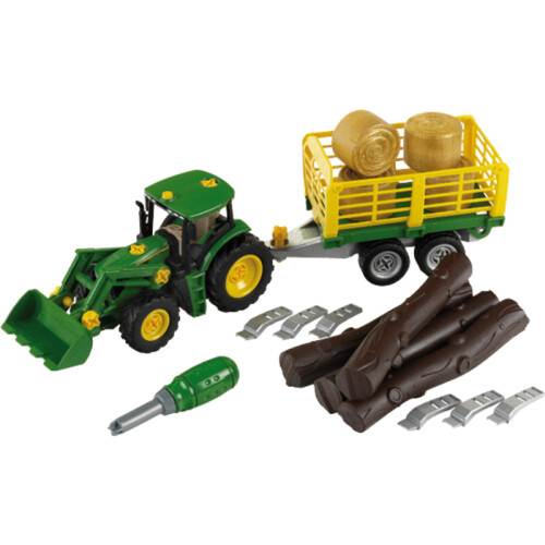 Traktor mit Anhänger für Baumstämme und Heu
