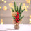 Juledekorasjonsgrener med blomsterpynt 5