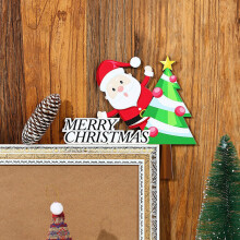 Adesivo per angolo porta in legno con carrozza di Babbo Natale e renne