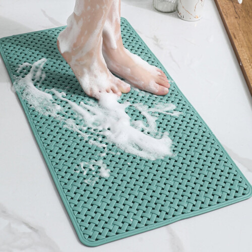 Tapis de bain avec ventouses et trous d'évacuation