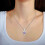 Collar con colgante de corazón bicolor con microincrustaciones 1