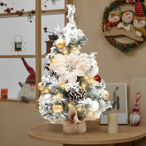 Mini flocked Christmas tree with LED lights and berries