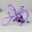 Bandeau bibi violet orné de fleurs en maille et de plumes 5