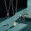 Conjunto de 8 pingentes ovais folheados a ouro com cabochão. 5