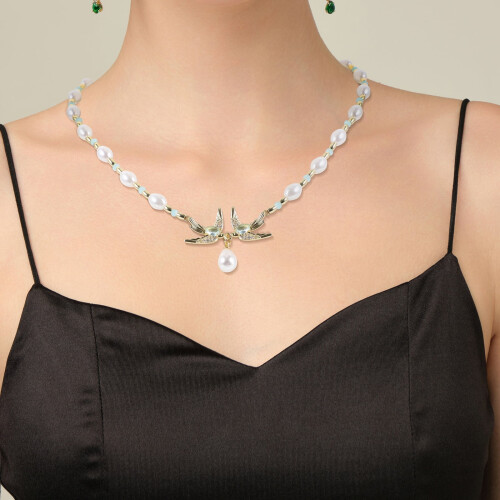 Dames choker met zwaluwparel 2