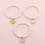 Parelarmband met stapelbare bloemhanger (3 stuks) 2