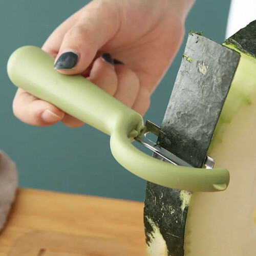 Stainless Steel Vegetable Peeler and Shredder 1