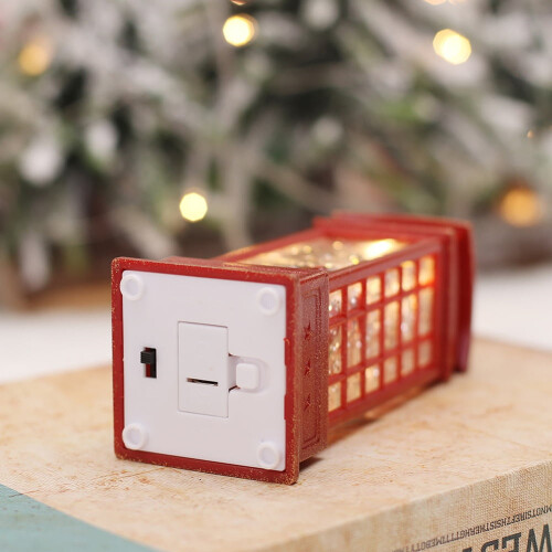 Julelykt i telefonkiosk med timer og 2