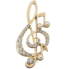 Spilla a forma di nota musicale dorata con strass (1 pezzo)