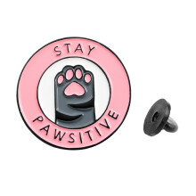 Broche redondo rosa con forma de garra de gato para abrigo, bolso o bufanda.