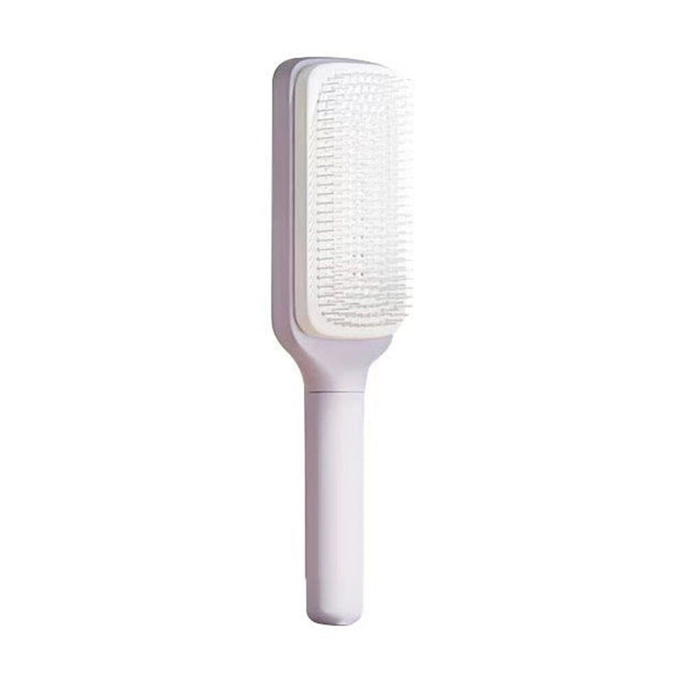 Self-cleaning massage comb with rotating telescopic teeth