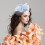 Tocado de mujer con flor de malla y diadema de cinta. 4