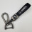 Car-themed leather key ring with silver hardware Opel 1