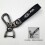 Car-themed leather keychain with silver hardware 1