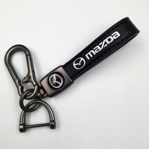 Car-themed leather keychain with silver hardware