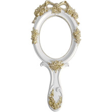 Vintage handheld mirror with white handle