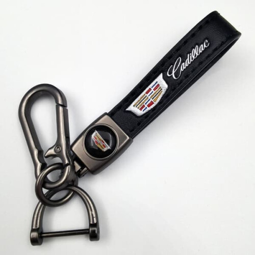 Car-themed leather keychain with silver Cadillac hardware