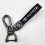 Car-themed leather keychain with silver hardware 1