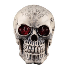 Calavera luminosa con ojos LED, decoración de resina para Halloween.