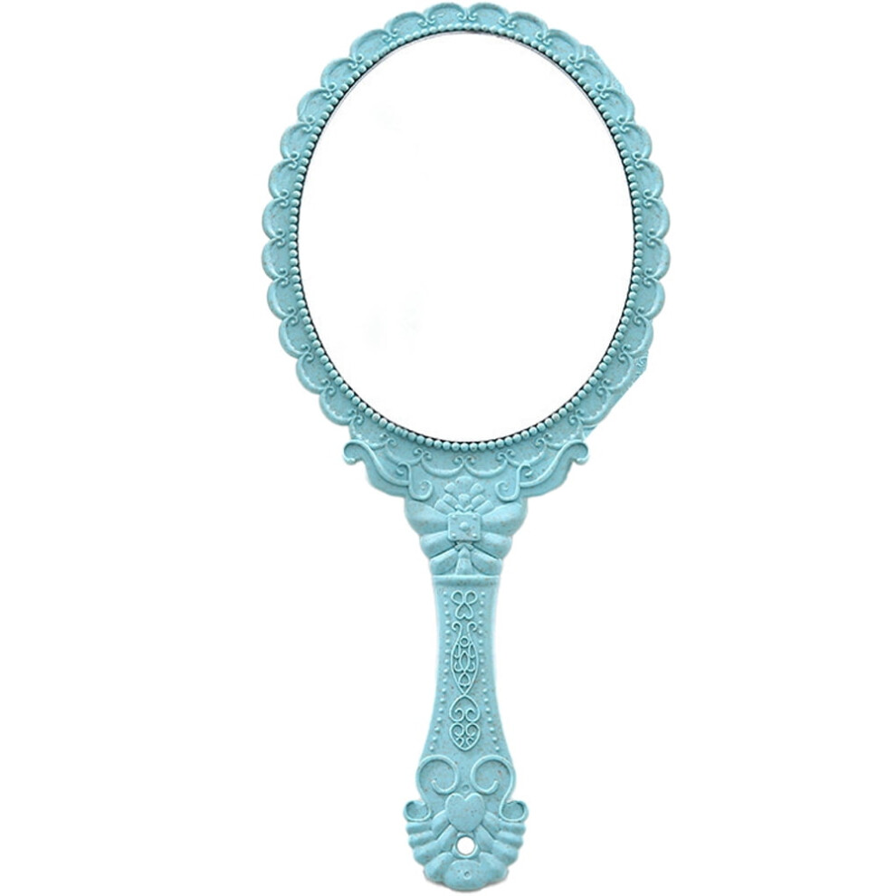 Vintage handheld hand mirror oval with handle