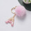 Roze pompon sleutelhanger met hars letter A 1