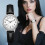 Relógio de pulso feminino com pulseira de couro preta e dourada. 1