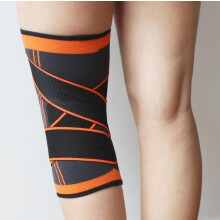 Adjustable knee brace for improved circulation orange M