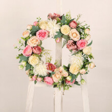Couronne printanière avec fleurs et fougères artificielles 40 cm