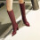 Damenstiefel mit Schlangenmuster, mittelhoch, mit hohem Absatz 1