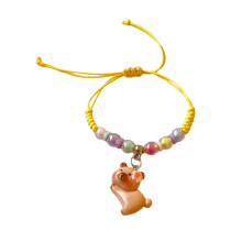 Pulseira capivara de resina tecida à mão para amantes de arte e joias.