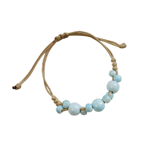 Pulseira de cerâmica feminina com design elegante.
