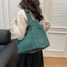 Bolsa feminina de lona, grande capacidade e com vários bolsos.