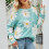 Dame oversized pullover med grønt margueritprint 1
