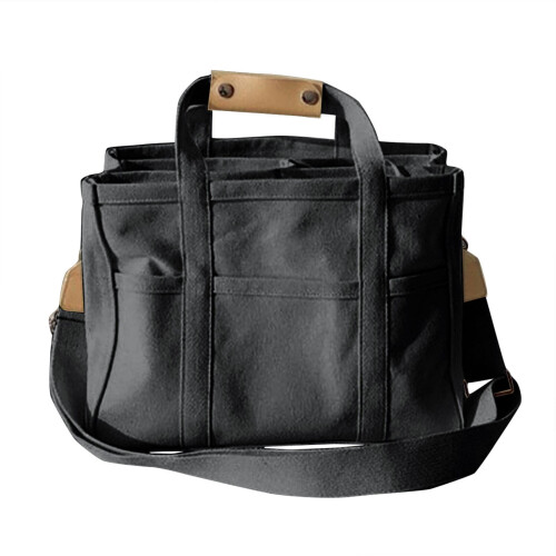 Bolsa feminina de lona com alça removível e múltiplos compartimentos.