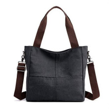 Naisten pienikokoinen kangaskassi, jossa on olkapäät ja crossbody-kangas.