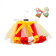 Meisjes tutu met pofmouwtje in regenboogkleuren en bijpassende haarspeld met strik