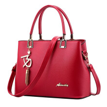 Dames leren crossbodytas met kwastjes en meerdere vakken