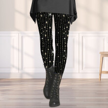 Zwarte, nauwsluitende legging voor dames met paillettenprint.