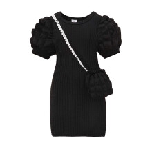 Schwarzes Strickkleid mit Puffärmeln für Kinder mit passender Tasche