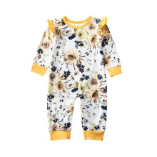 Blommig långärmad jumpsuit för babyflickor