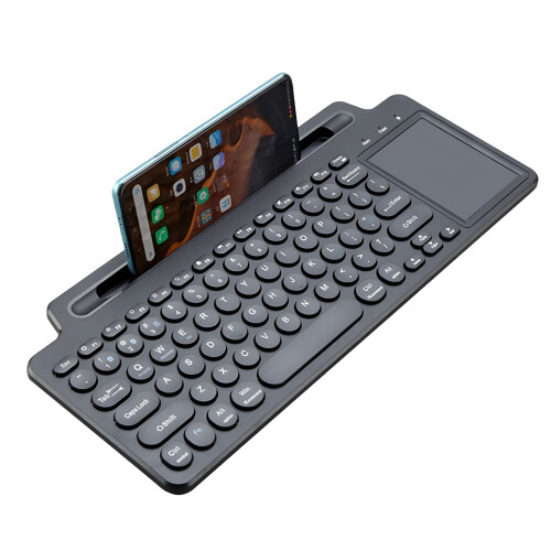 Langaton Bluetooth-näppäimistö tabletin ja puhelimen pidikkeellä